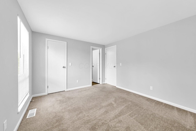 1030 Galliton Ct Unit B, Columbus, OH 43220 - unfurnished bedroom with carpet and baseboards