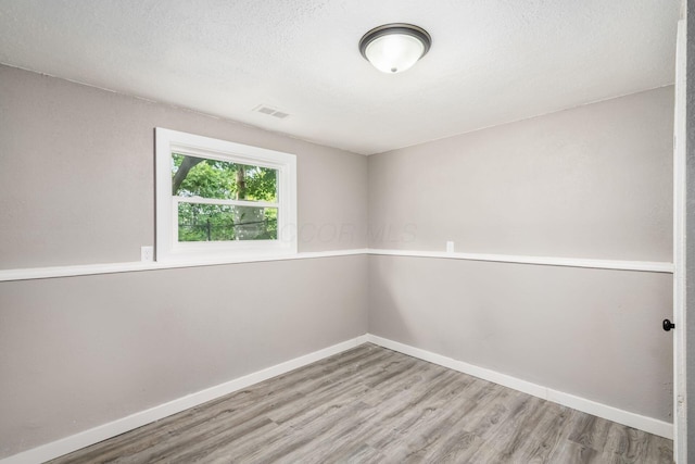 226 N Southampton Ave, Columbus, OH 43204 - spare room featuring wood finished floors and baseboards