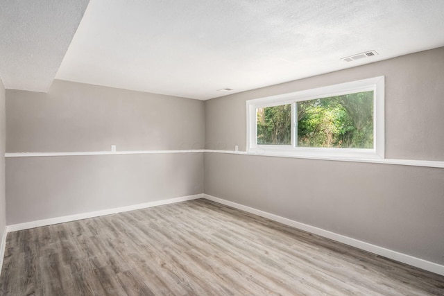 226 N Southampton Ave, Columbus, OH 43204 - unfurnished room featuring wood finished floors and a textured ceiling