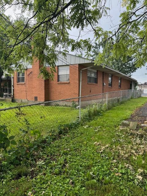 278 Cullman Rd, Columbus, OH 43207 - view of side of home featuring brick siding
