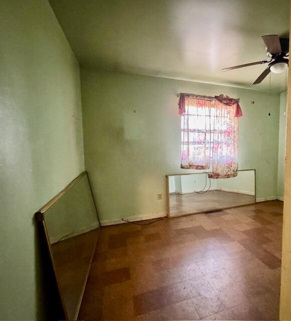 278 Cullman Rd, Columbus, OH 43207 - spare room with a ceiling fan and tile patterned floors