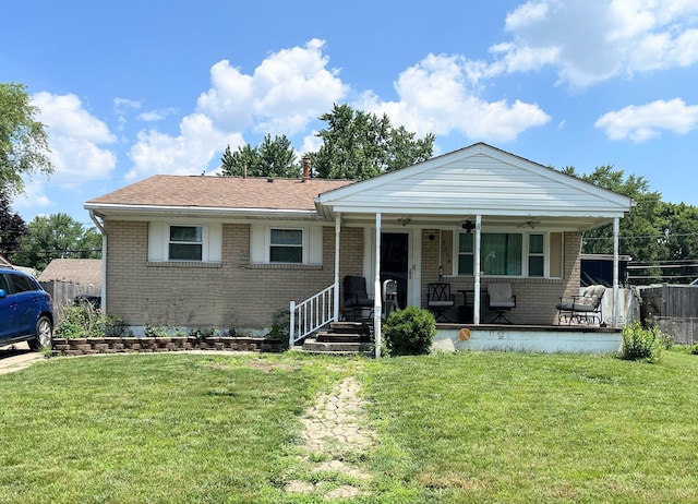 5254 Sedalia Dr, Columbus, OH 43232 - single story home with brick siding, ceiling fan, covered porch, and a shingled roof