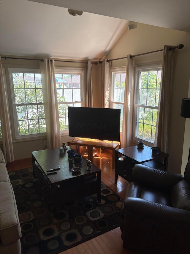 5264 Parkcrest Ln, Columbus, OH 43220 - living room featuring wood finished floors and vaulted ceiling