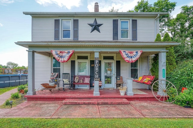 1715 Carroll Southern Rd NW, Carroll, OH 43112 - view of front of home with a porch and a chimney