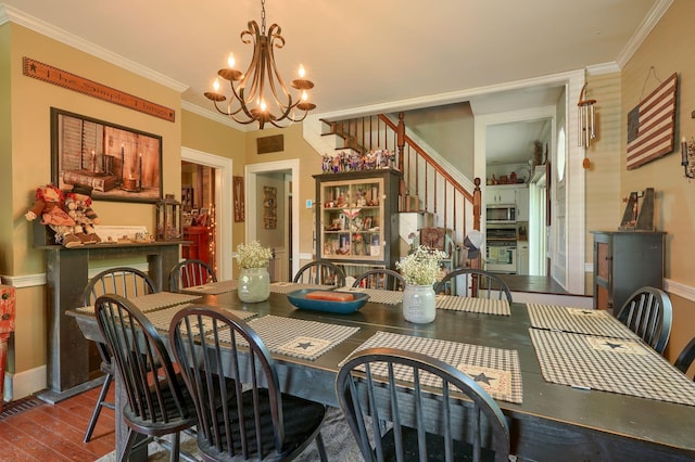 1715 Carroll Southern Rd NW, Carroll, OH 43112 - dining space with a chandelier, stairway, ornamental molding, and wood finished floors
