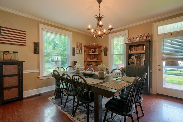 1715 Carroll Southern Rd NW, Carroll, OH 43112 - dining space featuring dark wood-style flooring, a chandelier, and crown molding