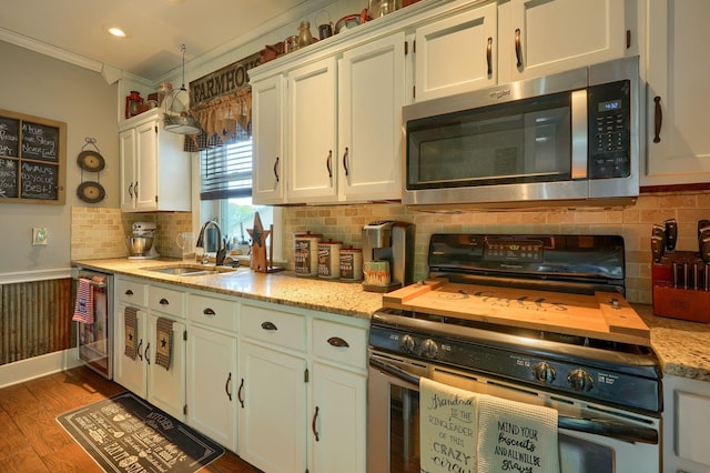 1715 Carroll Southern Rd NW, Carroll, OH 43112 - kitchen with stainless steel microwave, electric range, ornamental molding, decorative backsplash, and beverage cooler