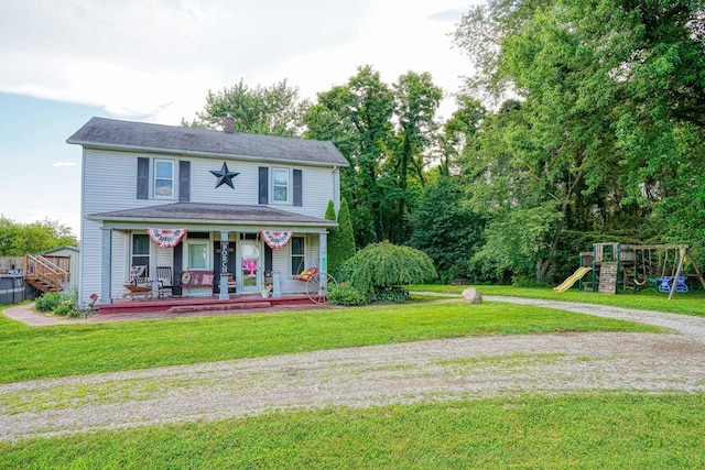 1715 Carroll Southern Rd NW, Carroll, OH 43112 - view of front of property with a porch, a playground, a front yard, and a chimney