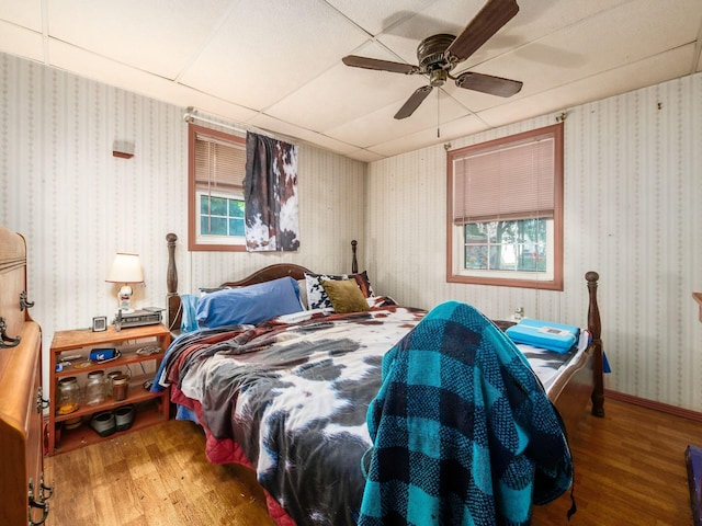 775 Koebel Ave, Columbus, OH 43207 - bedroom with wood finished floors, a ceiling fan, and a drop ceiling