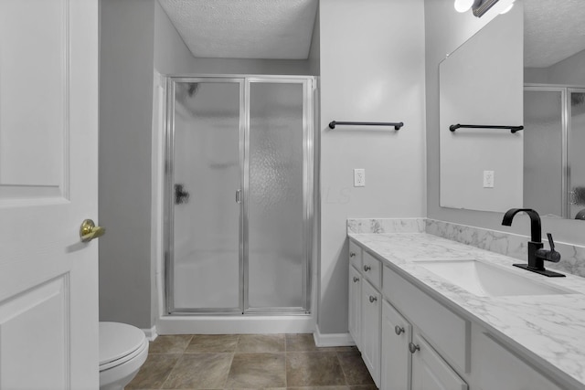 664 Bideford Ave Unit 11B, Blacklick, OH 43004 - full bathroom featuring a textured ceiling, vanity, and a shower stall