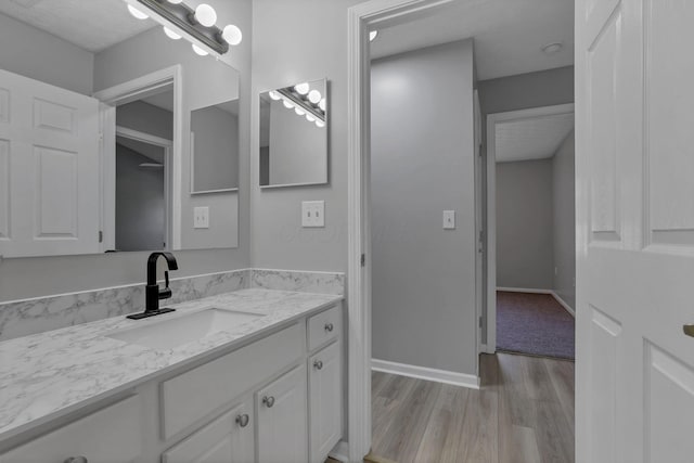 664 Bideford Ave Unit 11B, Blacklick, OH 43004 - bathroom with wood finished floors and vanity