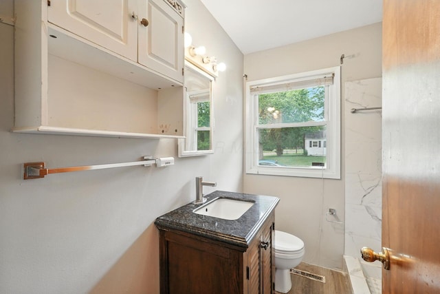 1193 Marble Dr, Columbus, OH 43227 - full bath with vanity, wood finished floors, and a shower