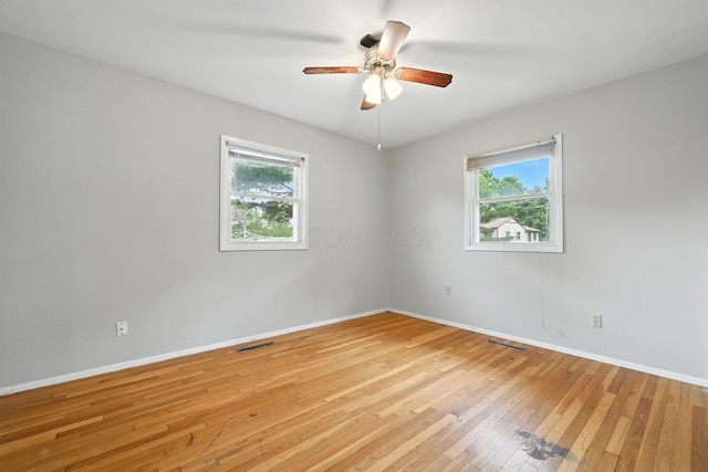 1193 Marble Dr, Columbus, OH 43227 - unfurnished room with healthy amount of natural light, light wood-style floors, and ceiling fan
