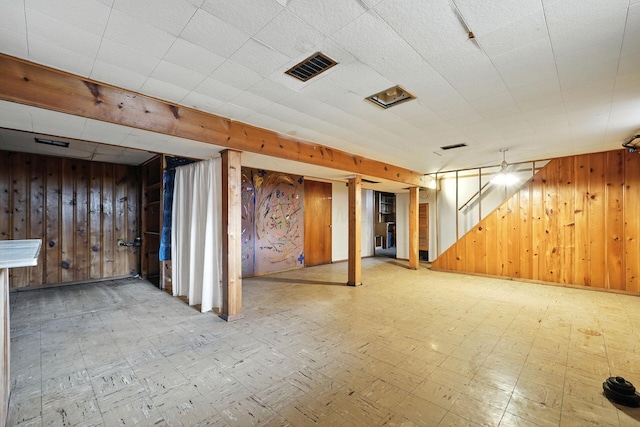 1193 Marble Dr, Columbus, OH 43227 - finished below grade area featuring wood walls and tile patterned floors