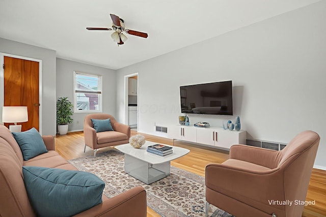 1193 Marble Dr, Columbus, OH 43227 - living area featuring light wood finished floors and ceiling fan