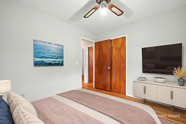 1193 Marble Dr, Columbus, OH 43227 - bedroom with wood finished floors and a ceiling fan