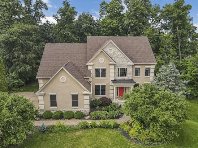 2773 Eleanor Way, Lewis Center, OH 43035 - view of front of house with stucco siding, stone siding, and a shingled roof