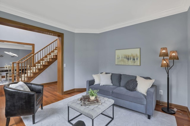2773 Eleanor Way, Lewis Center, OH 43035 - living room with wood finished floors, stairway, and crown molding