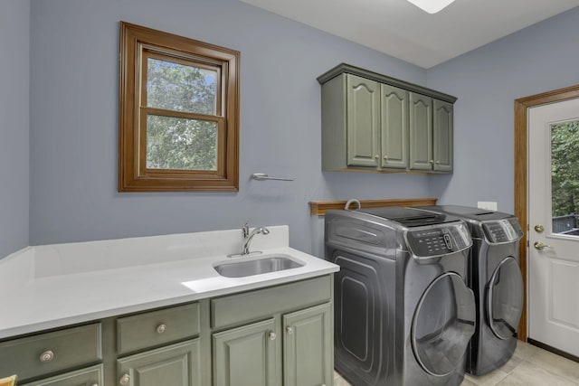 2773 Eleanor Way, Lewis Center, OH 43035 - washroom featuring cabinet space, washer and dryer, and light tile patterned flooring