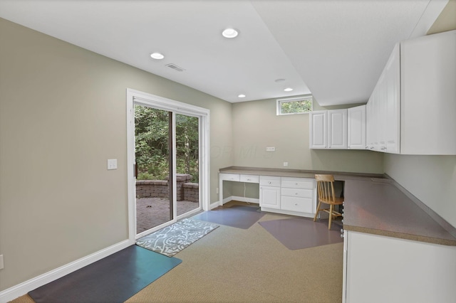 2773 Eleanor Way, Lewis Center, OH 43035 - unfurnished office with built in desk, dark carpet, plenty of natural light, and recessed lighting