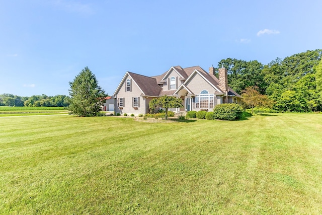 6247 State Route 61, Shelby, OH 44875 - view of front of house with a chimney and a front yard