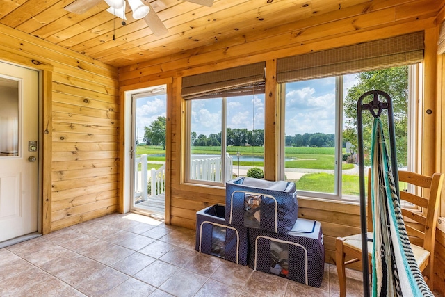6247 State Route 61, Shelby, OH 44875 - sunroom with plenty of natural light, ceiling fan, and a water view
