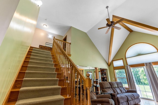 6247 State Route 61, Shelby, OH 44875 - staircase with ceiling fan, wood finished floors, and high vaulted ceiling