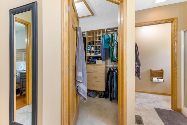 6247 State Route 61, Shelby, OH 44875 - walk in closet featuring tile patterned floors