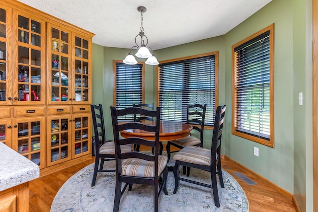 6247 State Route 61, Shelby, OH 44875 - dining room with baseboards and wood finished floors