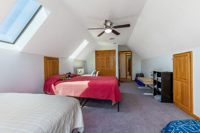 6247 State Route 61, Shelby, OH 44875 - carpeted bedroom with a skylight, lofted ceiling, and ceiling fan