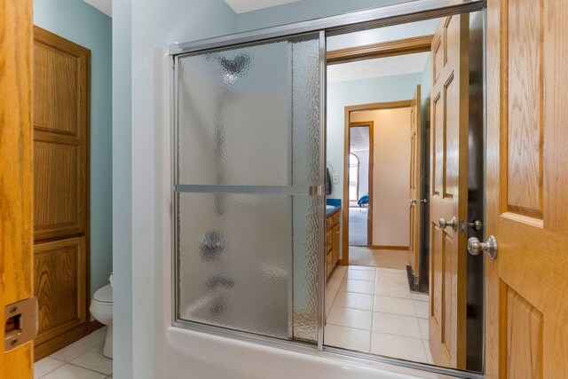 6247 State Route 61, Shelby, OH 44875 - bathroom with tile patterned flooring and combined bath / shower with glass door