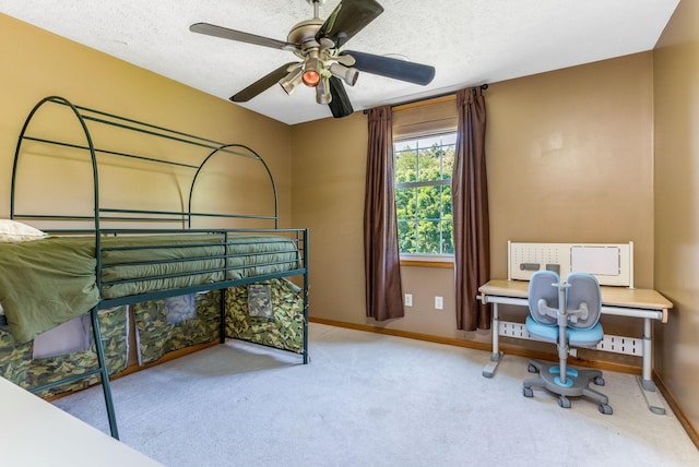 6247 State Route 61, Shelby, OH 44875 - carpeted bedroom featuring a textured ceiling and ceiling fan