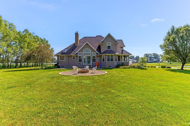 6247 State Route 61, Shelby, OH 44875 - rear view of property with an outdoor fire pit, a yard, and a chimney