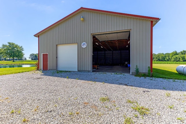 6247 State Route 61, Shelby, OH 44875 - detached garage with a water view