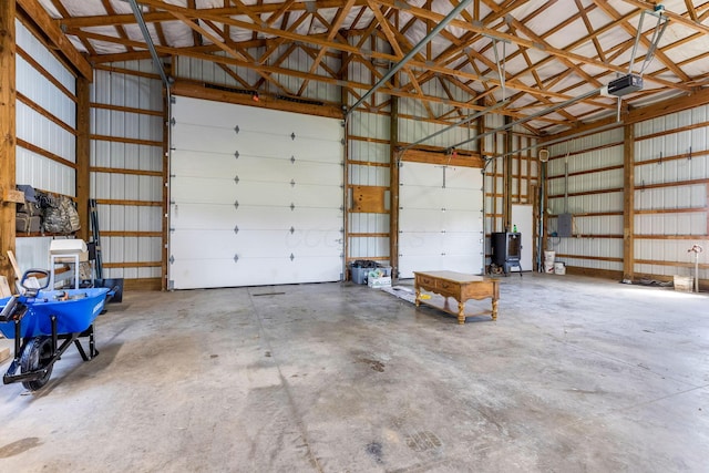 6247 State Route 61, Shelby, OH 44875 - garage featuring metal wall and a garage door opener