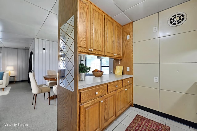 141 Dunmore Rd, Circleville, OH 43113 - kitchen featuring light countertops and brown cabinets