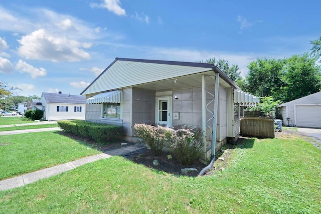 141 Dunmore Rd, Circleville, OH 43113 - view of front of house with a front lawn