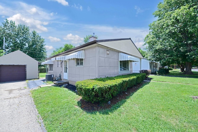 141 Dunmore Rd, Circleville, OH 43113 - single story home featuring an outdoor structure, a front yard, and a garage