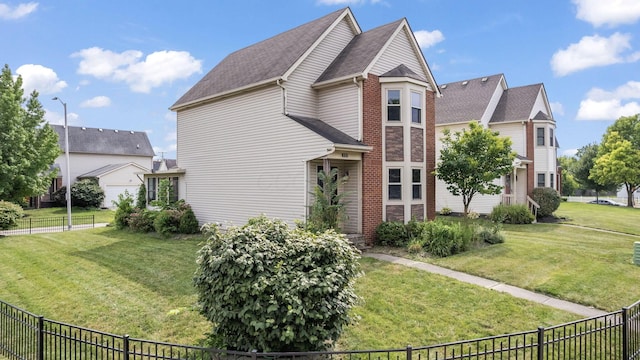 777 Mayme Moore Pl, Columbus, OH 43203 - view of front facade with a shingled roof and brick siding