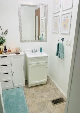 1231 Parkway Dr Lot # 26, Logan, OH 43138 - bathroom with vanity and baseboards