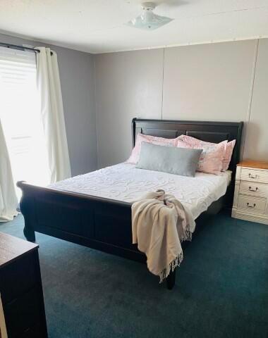 1231 Parkway Dr Lot # 26, Logan, OH 43138 - bedroom featuring dark carpet