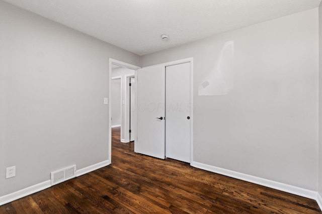 4256 Eleanor Ave, Grove City, OH 43123 - unfurnished bedroom with dark wood finished floors and a closet