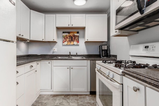5950 Ambleside Dr, Columbus, OH 43229 - kitchen with white appliances and white cabinets