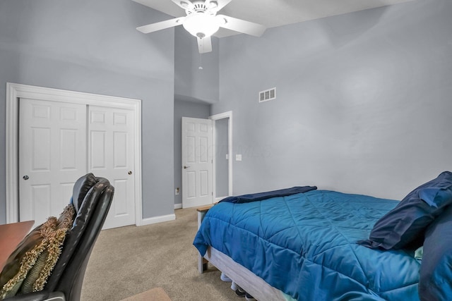 4887 Rays Cir, Dublin, OH 43016 - bedroom featuring light colored carpet, high vaulted ceiling, ceiling fan, and a closet