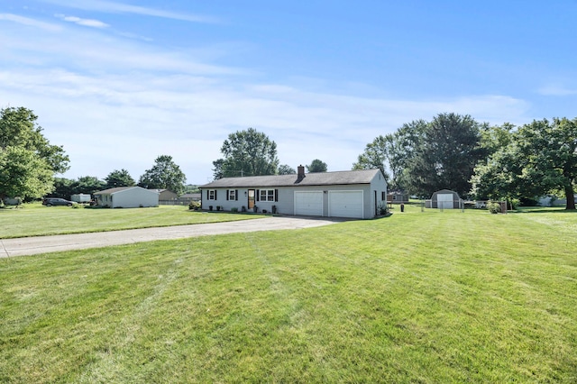 94 Fox Chase Dr, Newark, OH 43055 - view of front of house with a front yard, driveway, a storage unit, an attached garage, and a chimney
