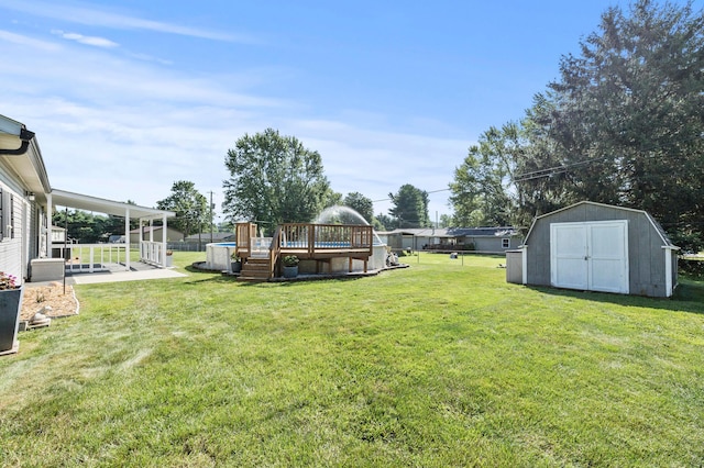 94 Fox Chase Dr, Newark, OH 43055 - view of grassy yard featuring a storage unit, a wooden deck, and a patio area