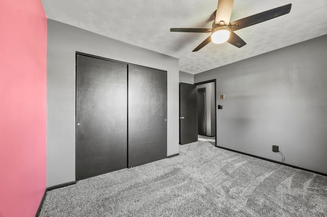 94 Fox Chase Dr, Newark, OH 43055 - unfurnished bedroom with carpet flooring, a closet, and a ceiling fan