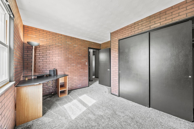 94 Fox Chase Dr, Newark, OH 43055 - carpeted office featuring brick wall