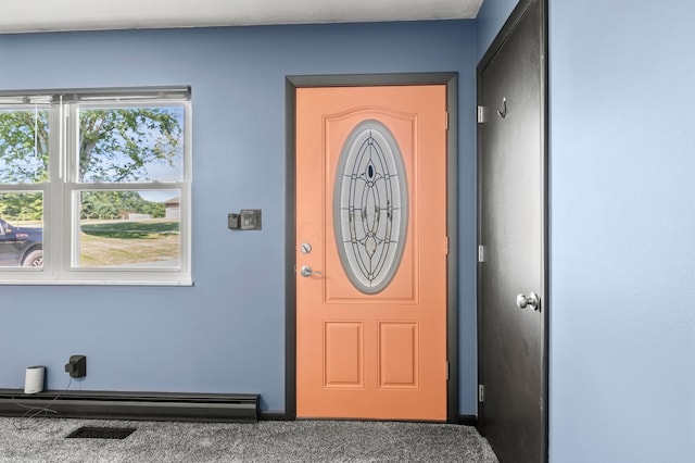 94 Fox Chase Dr, Newark, OH 43055 - entryway with a baseboard heating unit and carpet floors
