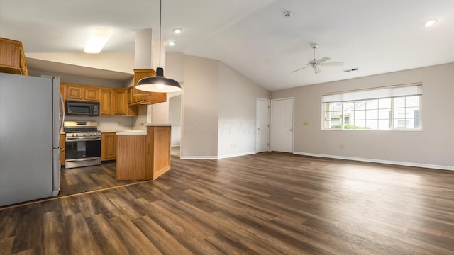 733 Windsor Ln, Heath, OH 43056 - kitchen with freestanding refrigerator, stainless steel gas stove, black microwave, vaulted ceiling, and open floor plan
